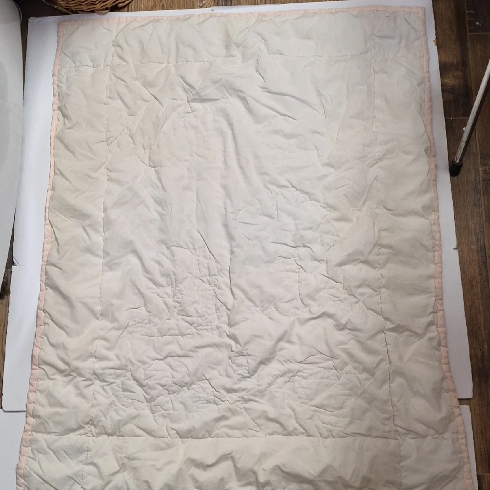 Pastel Embroidered Baby Quilt with Floral Accents